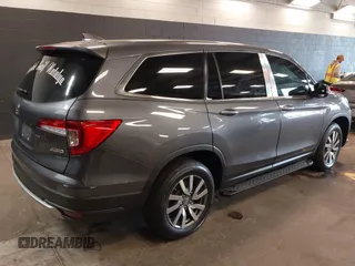 2022 Honda Pilot EX-L with VIN 5FNYF6H59NB000754, listed as a IAAI auction lot 42090576 with 32,813 mi miles and . Bid and sale history available at DreamBid. Image 4.