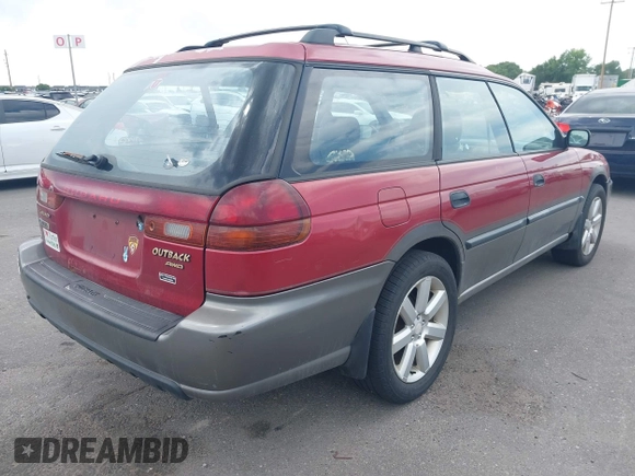 1996 Subaru Legacy Outback with VIN 4S3BG6856T7984886, listed as a IAAI auction lot 42620122 with 253,712 mi miles and . Bid and sale history available at DreamBid. Image 4.