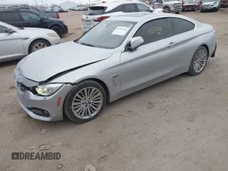 2014 BMW 4 Series 428i xDrive with VIN WBA3N5C53EF716542, listed as a IAAI auction lot 41157641 with 135,264 mi miles and . Bid and sale history available at DreamBid. Image 18.