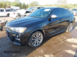 2016 BMW X4 M40i z VIN 5UXXW7C59G0M91223, wystawiony jako IAAI lot #42009394 z przebiegiem 144 771 mil mil oraz . Historia ofert i sprzedaży dostępna na DreamBid. Obrazek 2.