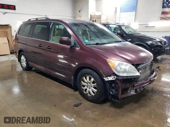 2010 Honda Odyssey EX-L with VIN 5FNRL3H62AB047431, listed as a Copart auction lot 46870685 with 173,468 mi miles and Salvage Title. Bid and sale history available at carsss.com. Image 4.