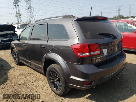 2019 Dodge Journey SE with VIN 3C4PDCBG0KT784247, listed as a Copart auction lot 70984424 with 106,073 mi miles and Salvage Title. Bid and sale history available at DreamBid. Image 2.
