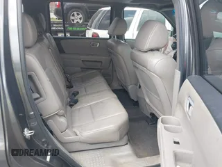 2012 Honda Pilot EX-L with VIN 5FNYF4H53CB026381, listed as a IAAI auction lot 41802360 with 165,425 mi miles and . Bid and sale history available at DreamBid. Image 8.