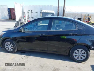 2016 Hyundai Accent SE z VIN KMHCT4AE9GU085523, wystawiony jako IAAI lot #42208002 z przebiegiem 94 653 mil mil oraz . Historia ofert i sprzedaży dostępna na DreamBid. Obrazek 14.