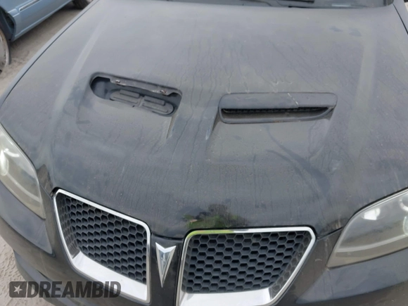 2009 Pontiac G8 with VIN 6G2ER57789L232134, listed as a IAAI auction lot 41864803 with 166,717 mi miles. Bid and sale history available at carsss.com. Image 6.