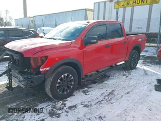 2021 Nissan Titan Pro-4X with VIN 1N6AA1ED6MN532524, listed as a IAAI auction lot 41225606 with 44,225 mi miles and . Bid and sale history available at DreamBid. Image 2.