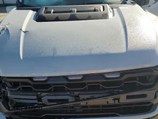 2024 Ford F-150 Raptor with VIN 1FTFW1RG9RFA65096, listed as a Copart auction lot 43702405 with 21,959 mi miles and Salvage Title. Bid and sale history available at DreamBid. Image 12.
