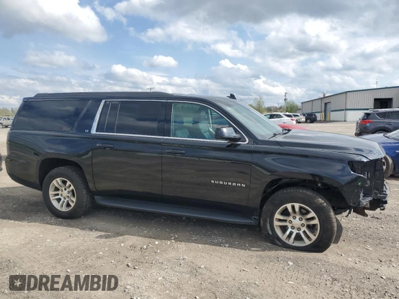 2015 Chevrolet Suburban LT with VIN 1GNSKJKC9FR510682, listed as a Copart auction lot 55427315 with 202,592 mi miles and Salvage Title. Bid and sale history available at DreamBid. Image 4.