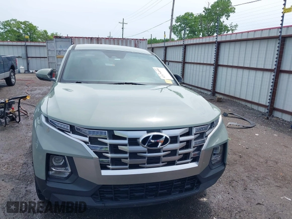 2022 Hyundai Santa Cruz SEL with VIN 5NTJB4AEXNH034989, listed as a IAAI auction lot 42176050 with 27,297 mi miles and . Bid and sale history available at DreamBid. Image 13.