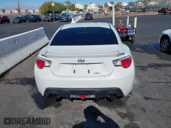 2015 Scion FR-S with VIN JF1ZNAA12F9709707, listed as a IAAI auction lot 41545940 with 107,575 mi miles. Bid and sale history available at carsss.com. Image 16.