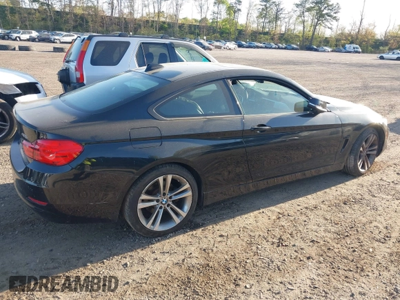 2014 BMW 4 Series 428i xDrive with VIN WBA3N9C55EF721295, listed as a IAAI auction lot 42139256 with 85,472 mi miles and . Bid and sale history available at carsss.com. Image 4.