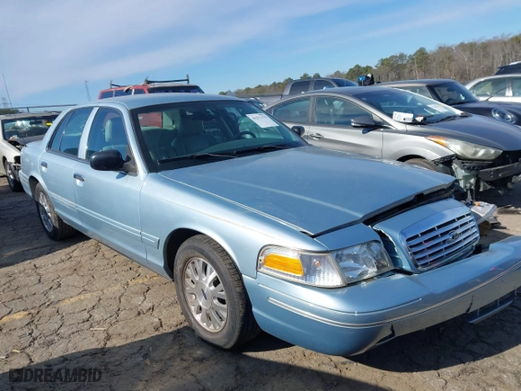 2005 Ford Crown Victoria LX with VIN 2FAFP74W65X135964, listed as a IAAI auction lot 41271175 with 82,494 mi miles. Bid and sale history available at carsss.com. Image 1.