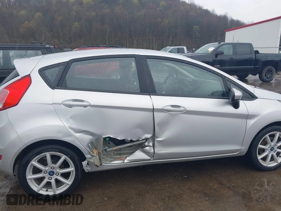 2019 Ford Fiesta SE with VIN 3FADP4EJ5KM137818, listed as a IAAI auction lot 42005468 with 110,560 mi miles and . Bid and sale history available at DreamBid. Image 6.