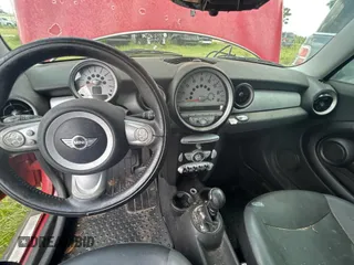 2010 MINI Hardtop with VIN WMWMF3C55ATZ24438, listed as a Copart auction lot 56395435 with Not Provided miles and Clean Title. Bid and sale history available at DreamBid. Image 9.