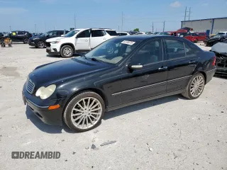 2003 Mercedes-Benz C 240 with VIN WDBRF61JX3F375295, listed as a Copart auction lot 60106075 with 153,767 mi miles and Salvage title. Bid and sale history available at DreamBid. Image 1.