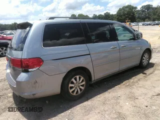 2010 Honda Odyssey EX-L z VIN 5FNRL3H74AB104446, wystawiony jako IAAI lot #42765331 z przebiegiem 319 510 mil mil oraz . Historia ofert i sprzedaży dostępna na DreamBid. Obrazek 4.