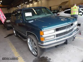 1997 Chevrolet Tahoe with VIN 1GNEK13R8VJ411512, listed as a IAAI auction lot 41583085 with 239,481 mi miles. Bid and sale history available at carsss.com. Image 1.