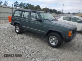 1993 Jeep Cherokee Sport with VIN 1J4FT68S4PL588241, listed as a Copart auction lot 80115884 with 204,174 mi miles and Salvage Title. Bid and sale history available at carsss.com. Image 4.