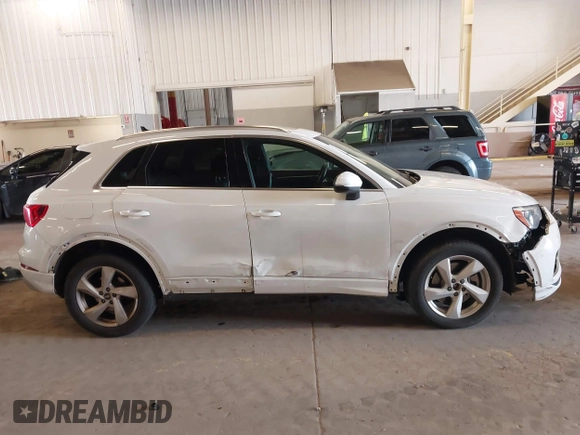 2021 Audi Q3 Premium z VIN WA1AUCF36M1089224, wystawiony jako IAAI lot #41998972 z przebiegiem 73 593 mil mil oraz . Historia ofert i sprzedaży dostępna na DreamBid. Obrazek 13.