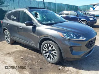 2020 Ford Escape SE Sport Hybrid with VIN 1FMCU9BZ0LUB81689, listed as a IAAI auction lot 41978638 with 69,831 mi miles and . Bid and sale history available at DreamBid. Image 1.