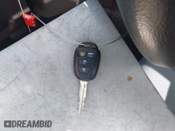 2015 Toyota Corolla L with VIN 2T1BURHE1FC252615, listed as a IAAI auction lot 41884936 with 113,805 mi miles and . Bid and sale history available at DreamBid. Image 11.