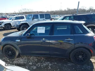 2015 MINI Hardtop 4 Door S with VIN WMWXU3C52F2B56517, listed as a IAAI auction lot 41437491 with 111,916 mi miles and . Bid and sale history available at DreamBid. Image 14.