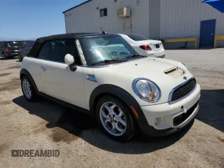 2011 MINI Convertible S with VIN WMWZP3C51BTX83131, listed as a Copart auction lot 57136355 with 118,364 mi miles and Clean Title. Bid and sale history available at DreamBid. Image 4.