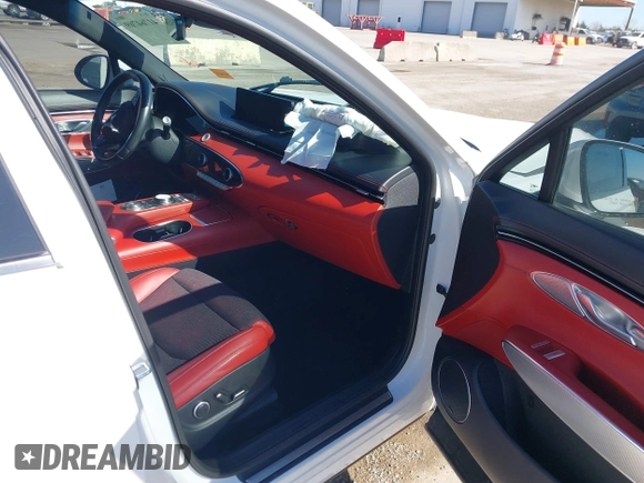 2023 Genesis GV70 2.5T with VIN KMUMADTB0PU087966, listed as a IAAI auction lot 41764769 with 33,865 mi miles and . Bid and sale history available at DreamBid. Image 5.