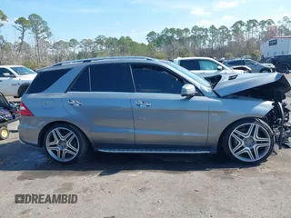 2013 Mercedes-Benz M ML 63 AMG with VIN 4JGDA7EB9DA155725, listed as a IAAI auction lot 41502675 with 64,849 mi miles. Bid and sale history available at carsss.com. Image 12.