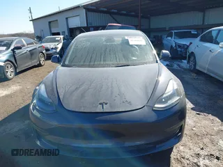 2023 Tesla Model 3 with VIN 5YJ3E1EA9PF548502, listed as a IAAI auction lot 41160649 with 28,759 mi miles and . Bid and sale history available at carsss.com. Image 11.