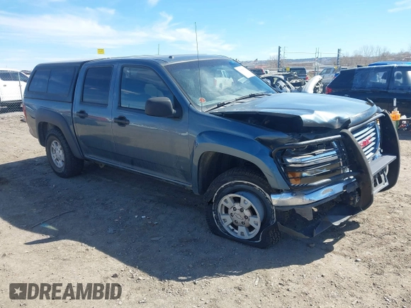 2006 GMC Canyon SLE1 with VIN 1GTDT136768277608, listed as a IAAI auction lot 41884392 with 128,834 mi miles. Bid and sale history available at carsss.com. Image 1.