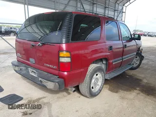 2005 Chevrolet Tahoe LS with VIN 1GNEC13V35R103563, listed as a IAAI auction lot 42645990 with 319,891 mi miles and . Bid and sale history available at DreamBid. Image 4.