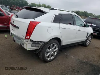 2015 Cadillac SRX Premium Collection with VIN 3GYFNGE32FS528514, listed as a Copart auction lot 61222534 with 104,433 mi miles and Salvage Title. Bid and sale history available at carsss.com. Image 3.