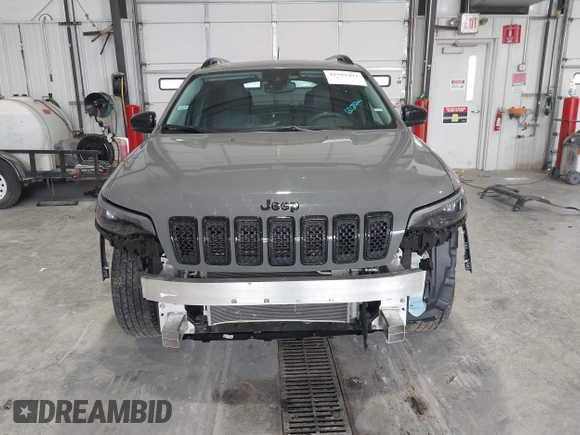 2023 Jeep Cherokee Altitude Lux with VIN 1C4PJMMBXPD115299, listed as a IAAI auction lot 41992492 with 60,232 mi miles. Bid and sale history available at carsss.com. Image 13.