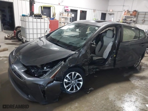 2021 Toyota Prius L Eco with VIN JTDKAMFU9M3132587, listed as a IAAI auction lot 41637275 with 84,203 mi miles. Bid and sale history available at carsss.com. Image 6.