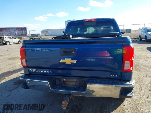 2017 Chevrolet Silverado 1500 LTZ with VIN 3GCUKSEC4HG371972, listed as a IAAI auction lot 41696294 with 123,297 mi miles and . Bid and sale history available at DreamBid. Image 17.