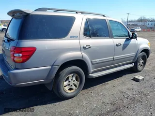 2001 Toyota Sequoia Limited with VIN 5TDBT48A21S027820, listed as a IAAI auction lot 41874513 with 237,717 mi miles. Bid and sale history available at carsss.com. Image 4.