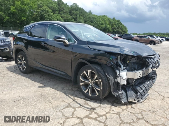 2020 Lexus RX 350 with VIN 2T2HZMDA8LC216493, listed as a Copart auction lot 61396315 with 43,650 mi miles and Salvage title. Bid and sale history available at DreamBid. Image 4.