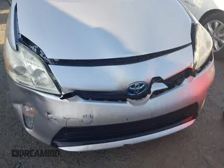 2012 Toyota Prius One with VIN JTDKN3DU6C1524096, listed as a IAAI auction lot 41938316 with 193,907 mi miles and . Bid and sale history available at DreamBid. Image 6.