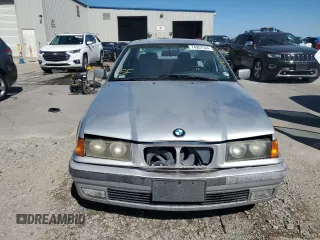 1998 BMW 3 Series 328iA with VIN WBACD4326WAV64466, listed as a Copart auction lot 74957534 with 152,963 mi miles and Salvage Title. Bid and sale history available at carsss.com. Image 5.