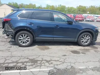 2019 Mazda CX-9 Touring z VIN JM3TCBCY6K0331905, wystawiony jako IAAI lot #42157842 z przebiegiem 84 211 mil mil oraz . Historia ofert i sprzedaży dostępna na DreamBid. Obrazek 14.