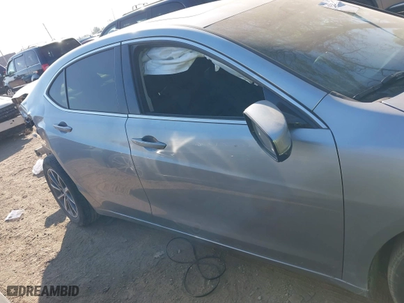 2019 Acura TLX with VIN 19UUB1F3XKA009385, listed as a IAAI auction lot 40584274 with 61,376 mi miles. Bid and sale history available at carsss.com. Image 13.