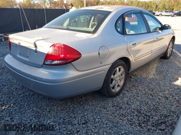 2004 Ford Taurus SES with VIN 1FAFP55U74A157139, listed as a IAAI auction lot 40979572 with 203,935 mi miles and . Bid and sale history available at DreamBid. Image 4.