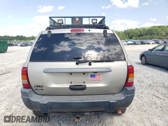 2004 Jeep Grand Cherokee Laredo z VIN 1J4GW48S84C177274, wystawiony jako Copart lot #56468855 z przebiegiem 236 014 mil mil oraz Szkoda całkowita • Salvage title. Historia ofert i sprzedaży dostępna na DreamBid. Obrazek 6.