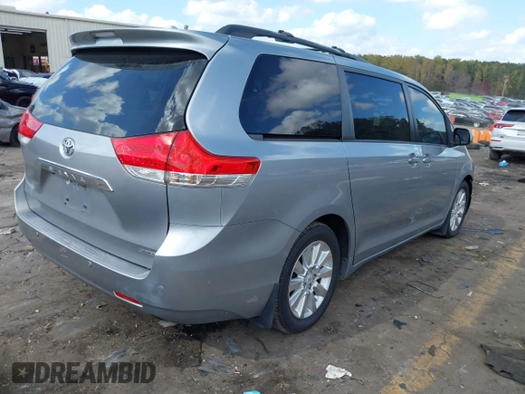 2011 Toyota Sienna XLE AAS with VIN 5TDYK3DC8BS157794, listed as a IAAI auction lot 40759823 with 211,716 mi miles and . Bid and sale history available at DreamBid. Image 4.