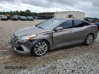 2013 Hyundai Azera z VIN KMHFH4JG4DA262993, wystawiony jako Copart lot #58497925 z przebiegiem 151 568 mil mil oraz Szkoda całkowita • Salvage title. Historia ofert i sprzedaży dostępna na DreamBid. Obrazek 1.