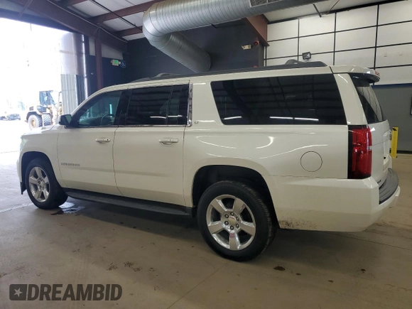 2015 Chevrolet Suburban LT with VIN 1GNSKJKC8FR147792, listed as a Copart auction lot 55622335 with 184,698 mi miles and Clean Title. Bid and sale history available at DreamBid. Image 2.