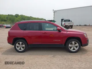 2016 Jeep Compass Latitude z VIN 1C4NJDEB8GD691172, wystawiony jako IAAI lot #42396044 z przebiegiem 172 012 mil mil oraz . Historia ofert i sprzedaży dostępna na DreamBid. Obrazek 13.