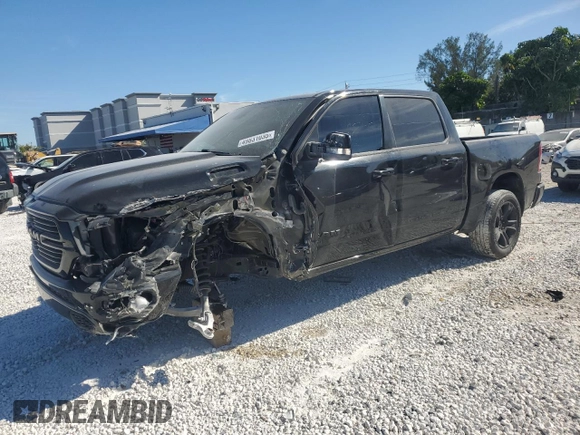 2021 Ram 1500 Lone Star with VIN 1C6RREFT2MN660620, listed as a Copart auction lot 49831035 with 49,276 mi miles and Salvage title. Bid and sale history available at DreamBid. Image 1.