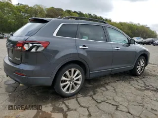 2014 Mazda CX-9 Grand Touring z VIN JM3TB2DA2E0432416, wystawiony jako Copart lot #51324875 z przebiegiem 201 404 mil mil oraz Szkoda całkowita • Salvage title. Historia ofert i sprzedaży dostępna na DreamBid. Obrazek 3.